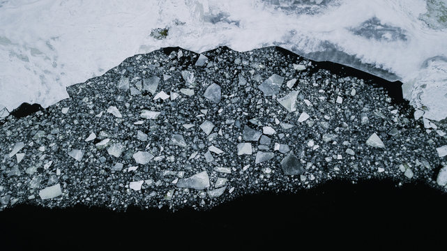 Plakaty drone view: pieces of ice on the river