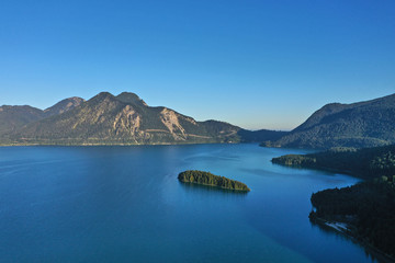 Fototapeta na wymiar Beautiful panorama of lake Walchensee, Bavaria Germany. Flying on drone. Island of Sassau
