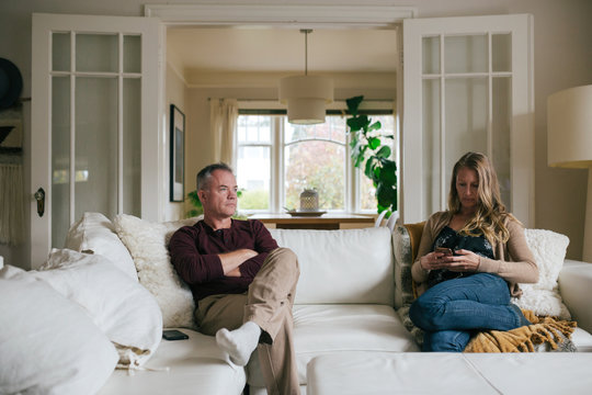 Marriage partners having a difficult conversation at home