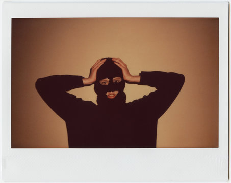 Young woman In Black Balaclava