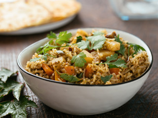 Gongura Biryani with rice, roselle leaves, carrots, potatoes, eggplant and onions