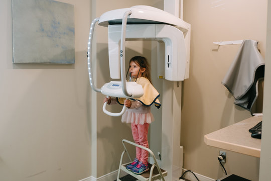 little girl gets dental x-rays