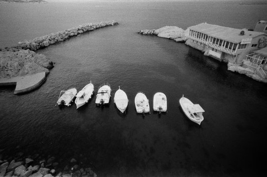 Fototapeta A beautiful black and white film photo of a sea in Marseille