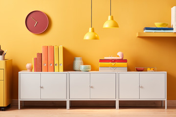 Cabinet with colorful folders in modern office