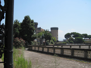 Fototapeta na wymiar Neapolitan cityscape with Castel Nuovo on a sunny day.