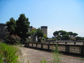 Fototapeta na wymiar Neapolitan cityscape with Castel Nuovo on a sunny day.