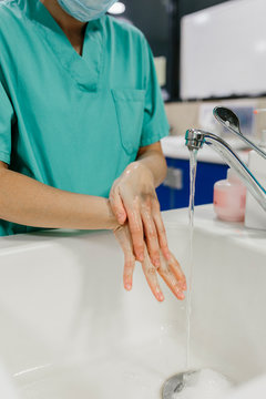 Nurse washing hands at the hospital