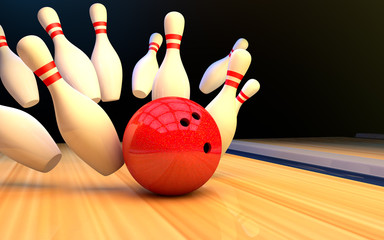 Bowling strike with a ball and skittles