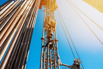 Obraz premium Drilling rig in oil field for drilled into subsurface in order to produced crude, inside view. Petroleum Industry.