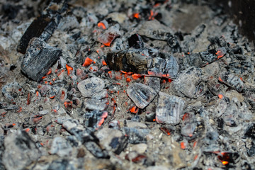 Dinner is cooked on hot coals