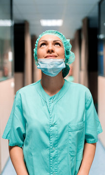 Female Doctor In Uniform And Mask