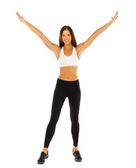 Fototapeta premium Sexy fitness woman posing in studio - isolated on a white background