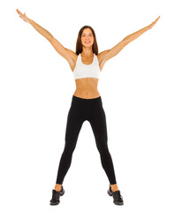 Sexy fitness woman posing in studio - isolated on a white background