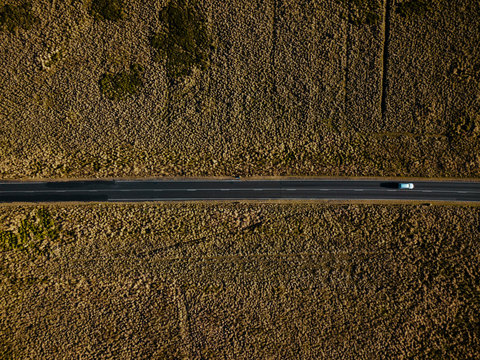 Straight roadway in plain