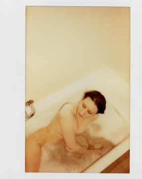 Young Androgyne Woman In Bath