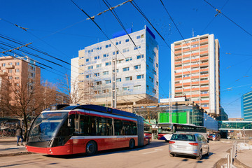 Naklejka premium Trolleybus car and shuttle bus at Hauptbahnhof in Salzburg Austria