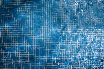 Looking into the bottom of a blue pool