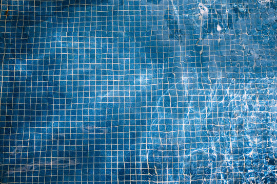 Looking into the bottom of a blue pool