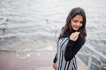 Portrait of young beautiful indian or south asian teenage girl in dress.