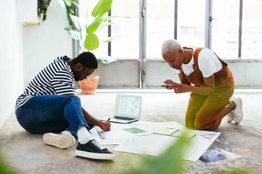 Designers working on the new project.