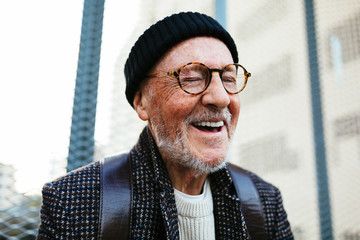 Close up of senior man smiling outdoors