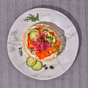 Vegan Carrot Smoked Salmon and Cashew Cream Cheese on an Everything Bagel
