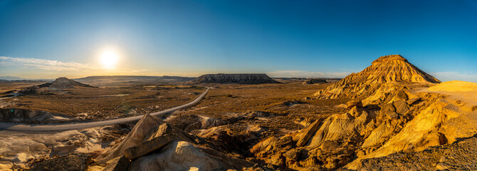 Panoramic of the Road that runs through the Bardenas Reales of Navarra, Spain