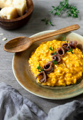 Pumpkin risotto with anchovies and thyme 