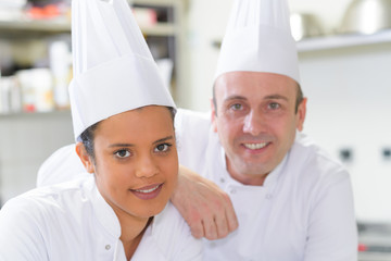 portrait of friendly workers at bakery