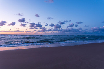 North sea, sandy beach at sunset