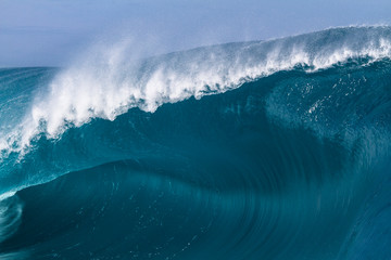 Close up of a huge and powerful wave breaking in Tahiti