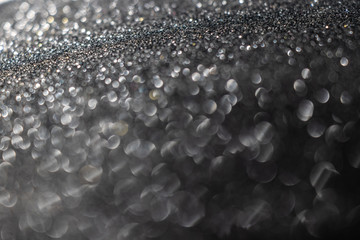 Abstract celebrate, twinkled bright bokeh defocused and sparkles background. Greeting card or invitation. Sparkling Lights Festive background.