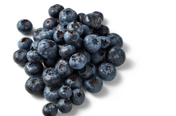 Fresh blueberries isolated on white background - close up.Bilberry on white background. Flat lay, copy space