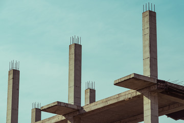 Modern construction site, concrete structure, building under construction, reinforced concrete structure. Construction site concept. Atmospheric background.