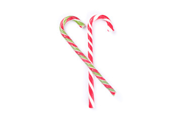 Sweet candy canes isolated on white background
