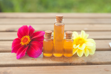 dahlia essential oil in  beautiful bottle on table