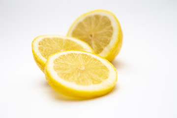  Freshly cut lemon. Sliced ​​lemon on white background.