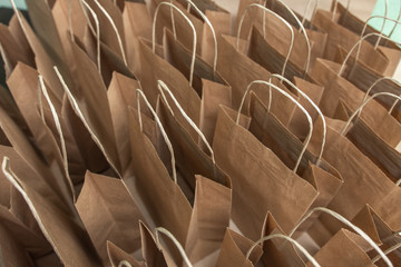 Obraz premium look from the top at the many open packages. environmentally friendly. place for text. Lots of craft packages close up. Business concept.