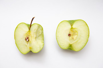 Freshly cut apples. Sliced ​​apples on white background.