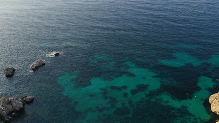 Wonderful aerial photography of the coast of Mallorca, ideal for wallpapers, crystal clear waters, blue and turquoise green, with rocks, to relax the view