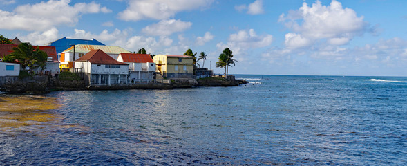 The picturesque coastline of Le Moule town in Guadeloupe, Grande-Terre island, french West Indies