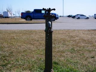 Faucet in Nature Stock Photo