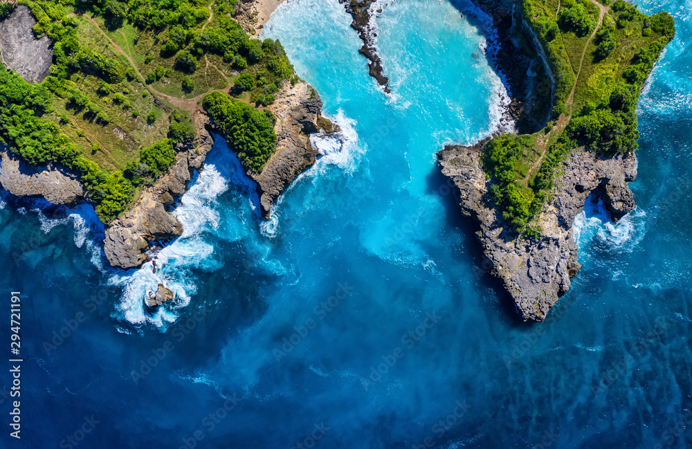 Wall mural coast as a background from top view. turquoise water background from top view. summer seascape from 