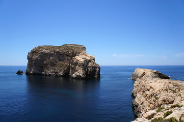 Fungus Rock and landscape of Dwejra Bay next to Azure Window (it-Tieqa Żerqa) in Xlendi, Gozo