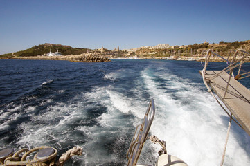 Landscape of Mgarr Harbor in Gozo, Malta visible from yacht deck