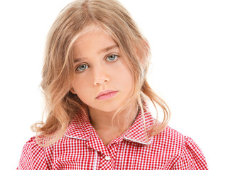 Sad little girl on white background