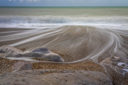 Retreating waves and undertow