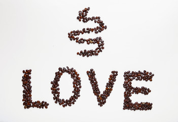 Word LOVE made of coffee beans on light background