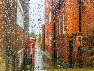 Town through rain drops