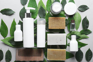 Accessories and cosmetics for personal hygiene on light background